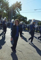 Anne Chambers, marching in a parade